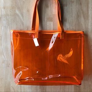 Orange Clinique See-Through tote
